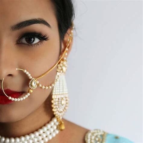 Pearl Nath With Kundan Nose Ring Paired With Matching Pearl Necklace And Heavy Earrings