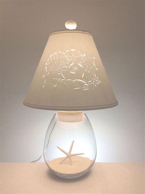 perfect   seashell collection  clear glass lamp