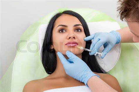 Beautiful Woman Gets An Injection In Her Lips Stock Image Colourbox