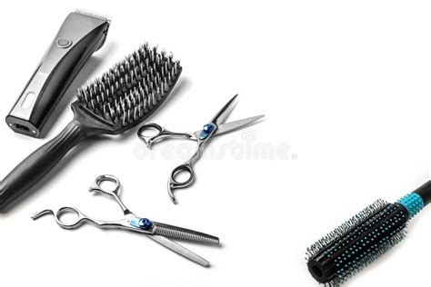 Scissors Hair Clipper And Combs On White Background Stock Photo