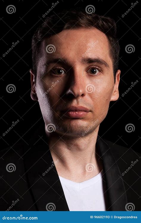 Dramatic Portrait Of Businessman On Black Background Stock Image