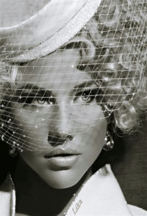 A Black And White Photo Of A Woman Wearing A Hat With Veil On Her Head