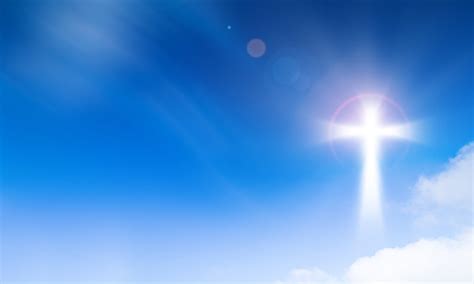 Holy Light Of Crucifix Cross On Blue Sky Background Hope And Freedom