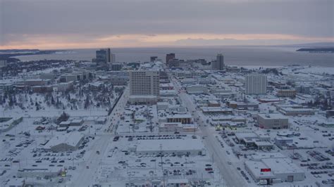 4k Stock Footage Aerial Video Flying Over Snow Covered Downtown