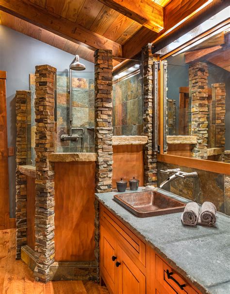 Barn wood flooring and ceiling, exposed brick wall, round bathtub in a great rustic bathroom. 16 Fantastic Rustic Bathroom Designs That Will Take Your ...