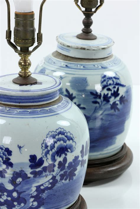 Visible metal is finished in matte gold. Lot Detail - 2 Chinese Blue and White Ginger Jar Lamps