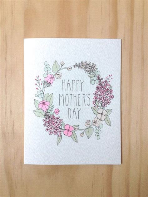 A Card That Says Happy Mothers Day With Pink Flowers And Green Leaves On It