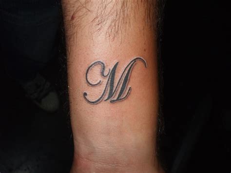 Men letter m design haircut. Awesome M letter tattoo - | TattooMagz › Tattoo Designs ...