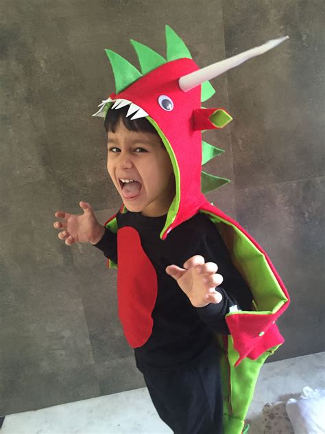 It's our mission to provide an unmatched experience when you are shopping for your halloween costumes, accessories, décor, and costume apparel. DIY Dragon costume- the cape was made with 4 red and 4 green felt sheets. The spikes and horn ...