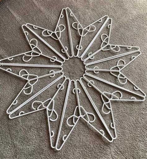 hack the diy coat hanger star decoration going viral this christmas hanger crafts diy