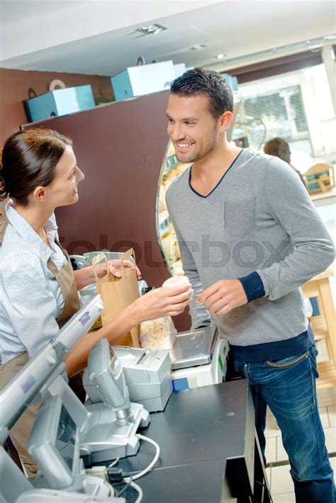 Client Being Served Stock Image Colourbox