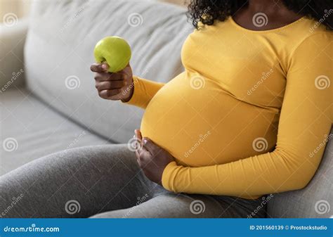 Closeup Of Black Pregnant Woman Holding Green Apple Stock Image Image