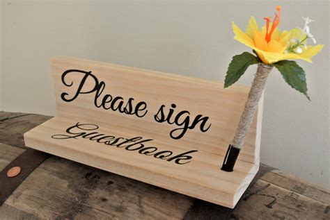 The fine quality guest book paper adds to the look and feel of the personalized product. Please sign our Guest book Pen holder with Decorative Personalized Sharpie pen. Matching to your ...