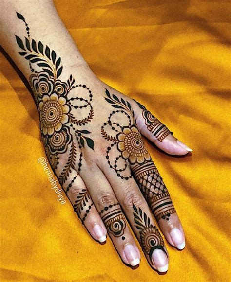 Stunning And Trending Back Hand Mehendi Designs For Brides