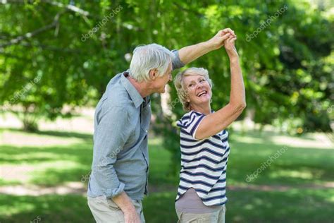 Senior Couple Dancing Stock Photo By ©wavebreakmedia 102331616