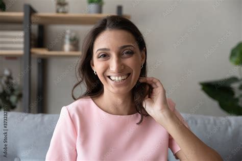 Headshot Close Up Portrait Of Smiling Arabic Indian Woman Talk Speak On Video Call Using Modern