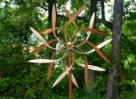 A Kinetic Copper Dual Wind Spinner For Outdoor Garden Decoration Stock
