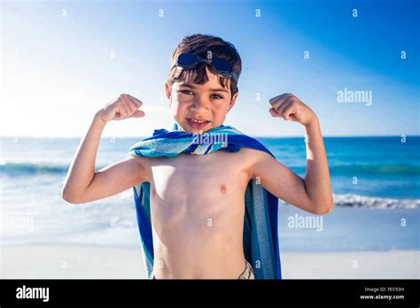 Cute Boy Showing His Muscles Stock Photo Alamy