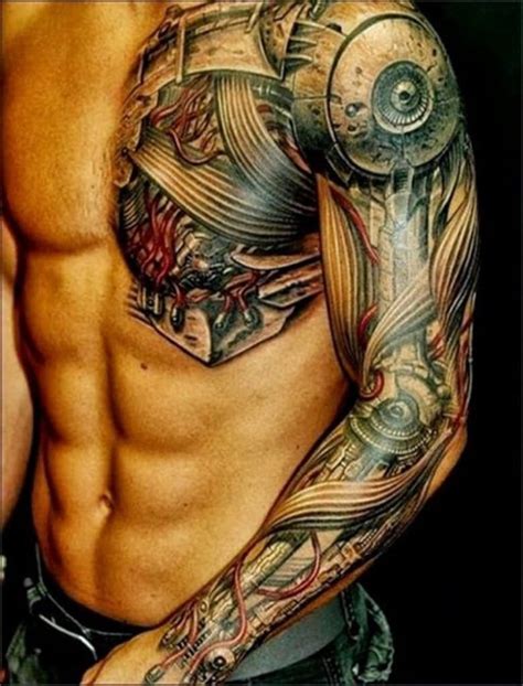 A Man With Tattoos On His Arm And Chest