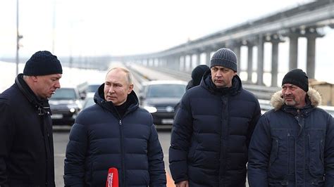 Putin Visits Key Crimea Bridge Damaged By Huge Explosion In October Cnn