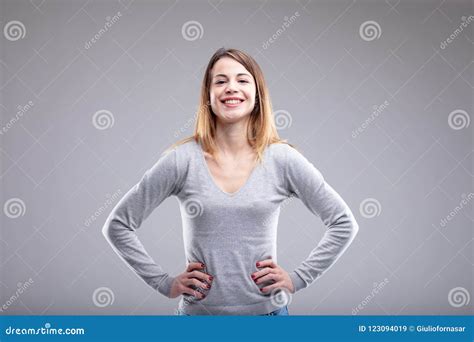 Grinning Adult Female Putting Hands On Her Hips Stock Image Image Of Strong Pretty 123094019