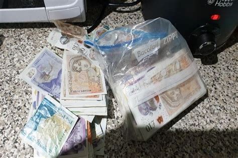 suspected drug dealer watches on as police seize £4 000 cash and drugs liverpool echo