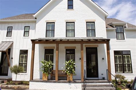 White Brick Home With Black Trim Discover The Bold And Timeless Look