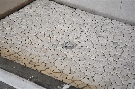 Since the spaces between each. 26 nice pictures and ideas of pebble bath tiles
