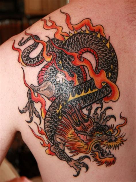 We don't have any reviews for men on the dragon. 100's of Chinese Dragon Tattoo Design Ideas Pictures Gallery