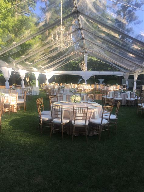Many orders ship within 24 hours! Boxwood Estates Wedding , clear tent , chandeliers , gold ...
