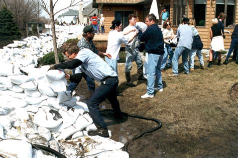 Severe Stormsflooding Fargo Nd 04101997 Residents Build Up A Sandbag Levee As