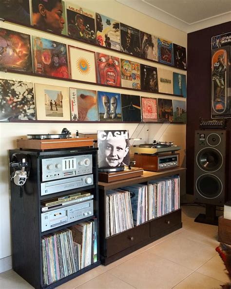 Picture Rails Make Great Storage For Current Listening Or For More