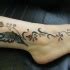 Stylized Ink Feather On Foot For Female Tattooimages Biz