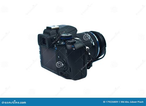 Back View Of A Black Colored Digital Camera With A Nice Lens Attached