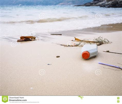 Garbage Rubbish On Beach Plastic Bottles Trash Environmental Pollution