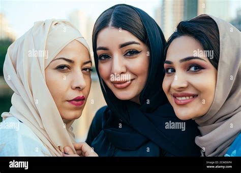 three women friends going out in dubai girls wearing the united arab emirates traditional abaya