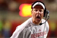 What is the favourite sports entertainment on thanksgiving day in the usa? bo pelini is under fire at nebraska