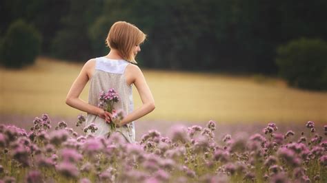 Girl With Flowers Standing In Field Hd Girls 4k Wallpapers Images Backgrounds Photos And