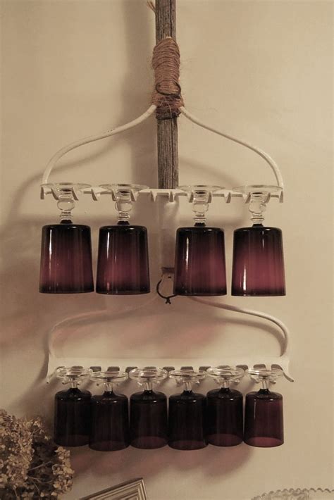 Why fill up your hands and arms trying to carry your wine when you can just grab the neck of the. Wine glass holder, antique rake. | Wine glass holder ...
