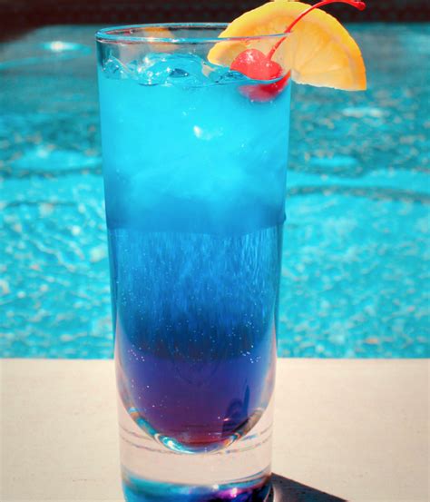 —taste of home test kitchen Blue Curacao Layered Summer Cocktail | Colorful drinks ...