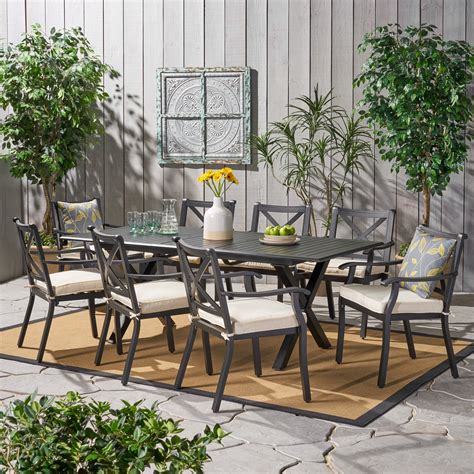 cascada outdoor 9 piece cast aluminum dining set with expandable dining table and water
