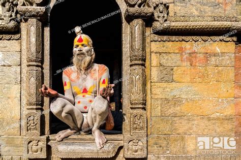 Naked Sadhu Holy Man Is Sitting In A Doorway Of Pashupatinath Temple Kathmandu Nepal Stock
