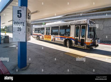 A Bus From The Octa Orange County Transit Authority Awaits Passengers