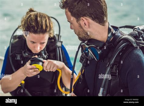 Diver Prepares His Equipment For Diving In The Sea Stock Photo Alamy