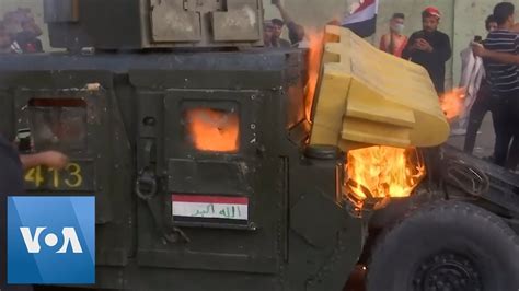 Iraqi Protesters Burn Humvee In Third Day Of Protests Youtube