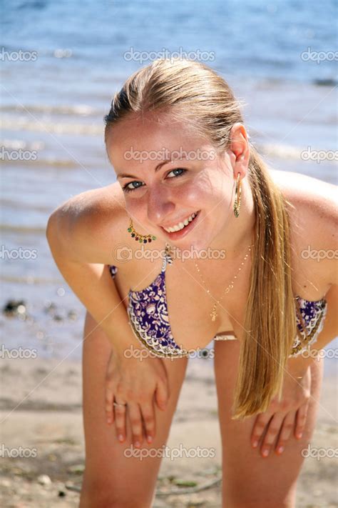 Woman Posing On The Beach Stock Photo Arkusha