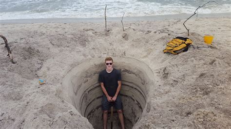last summer i dug a massive hole on the beach just for the pure fun of it note i m 6 3 which