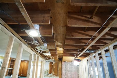 I would not expect to be able to install plywood and flooring and walk around up there, but you could possibly store some lightweight things. How To Install A Beam Above Ceiling Joists | Shelly Lighting