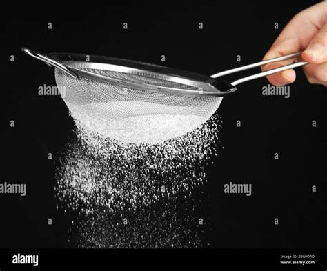 Sieve And Powdered Sugar On Black Background Stock Photo Alamy