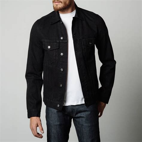 A Jet Black Denim Jacket Is A Striking Departure From The Usual Classic